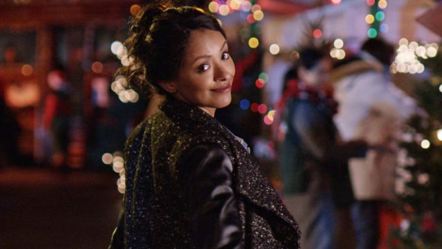 The coat of Abby Sutton (Kat Graham) in The Holiday Calendar