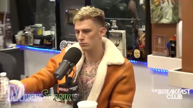 Orange sherpa jacket worn by Machine Gun Kelly in Machine Gun Kelly Pours his Heart out on The Breakfast Club (Interview)