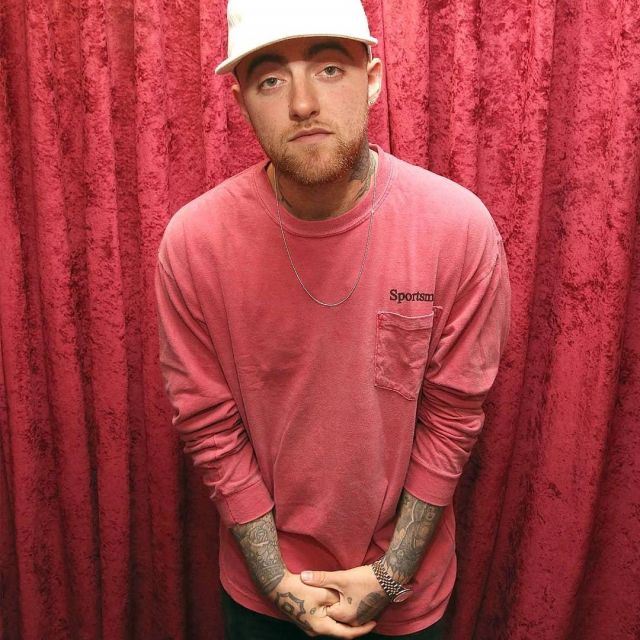 Red T-shirt worn by Mac Miller as seen in the In­sta­gram Ac­count @Mu ...