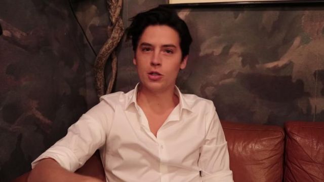 The white shirt worn by Cole Sprouse in the video YouTube New Internet Slang with Cole Sprouse of " The Tonight Show starring Jimmy Fallon