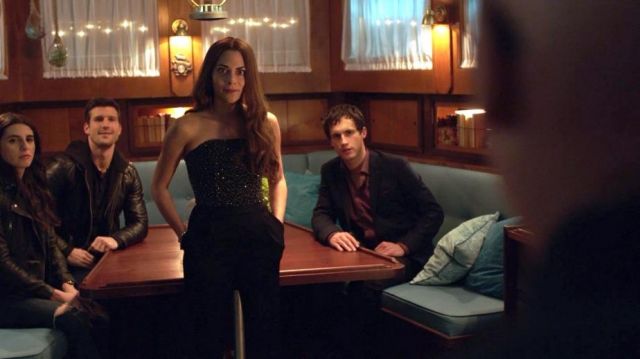 Strapless pantsuit worn by Maddie (Inbar Lavi) as seen in Imposters S01E09