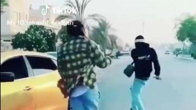 The plaid shirt of 6ix9ine in the video Crazy moment with 6ix9ine on dubai and the new dance challenge "Stoopid"