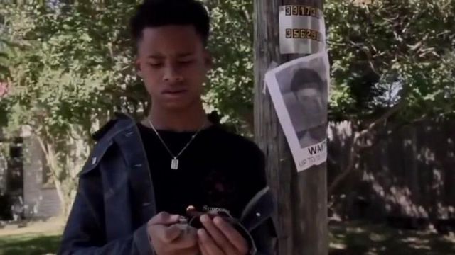 The chain of Taymor Travon McIntyre in the clip #FREETAYK TAY-K x THE RACE