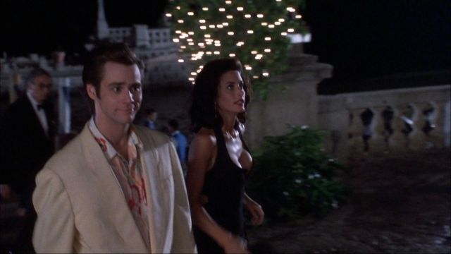The black evening dress worn by Melissa Robinson (Courtney Cox) in Ace Ventura, detective dogs and cats