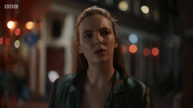Green silk Blazer worn by Villanelle (Jodie Comer) as seen in Killing Eve (S02E04)