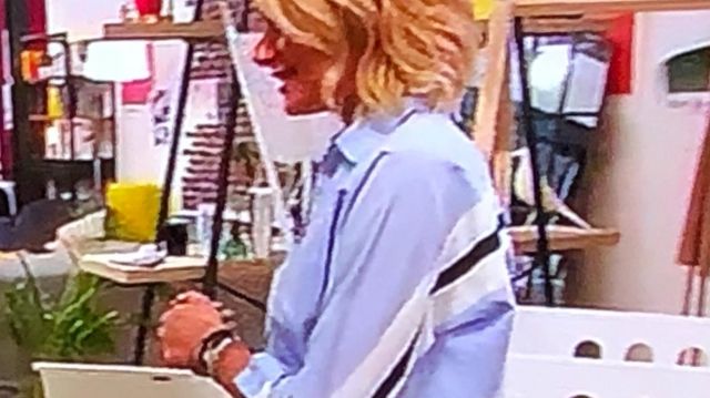The shirt is sky-blue range by Caroline Keslassy in the program Better at home