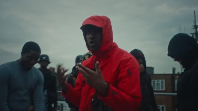 Parka red worn by Skepta in the clip Headie One - Back To Basics (feat.  Skepta)