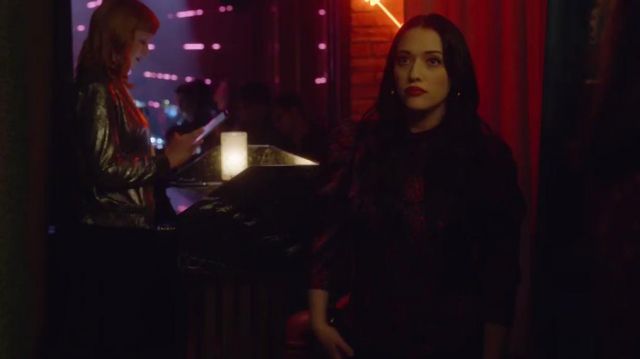 Purple and red top worn by Jules (Kat Dennings) as seen in Dollface (Season 1)