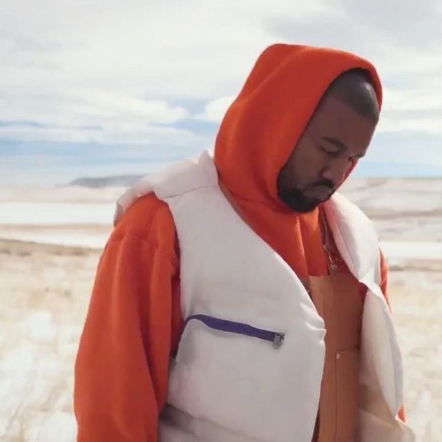 The down jacket white, without the handle, worn by Kanye West account on the Instagram of @kanyew.is