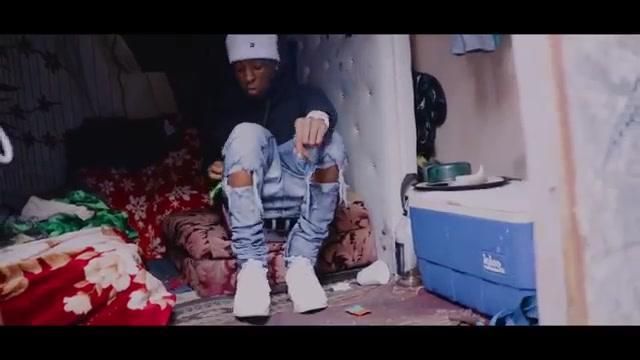 Denim pants worn by YoungBoy Never Broke Again in his Slime Belief music video
