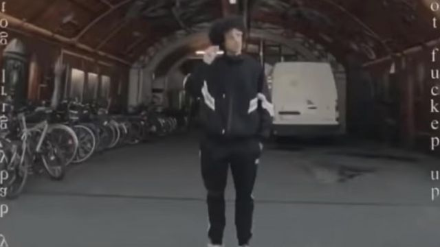 Black jacket with white stripes worn by Rilès in Rilès - Wasted in Berlin (RILÈSNIPPETZ#5)