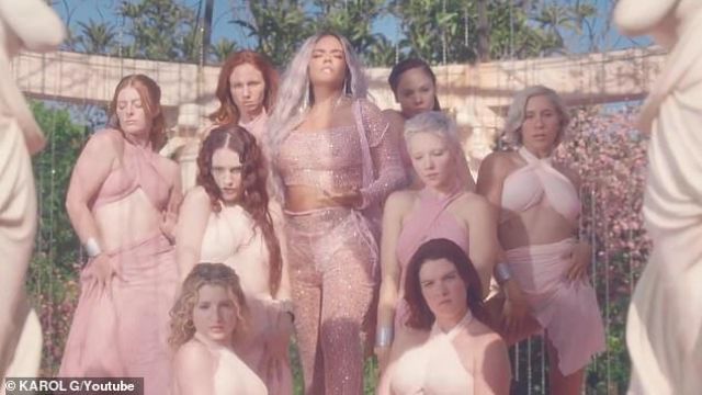Pink glittery mesh matching set worn by Karol G on her Tusa video vlip with Nicki Minaj