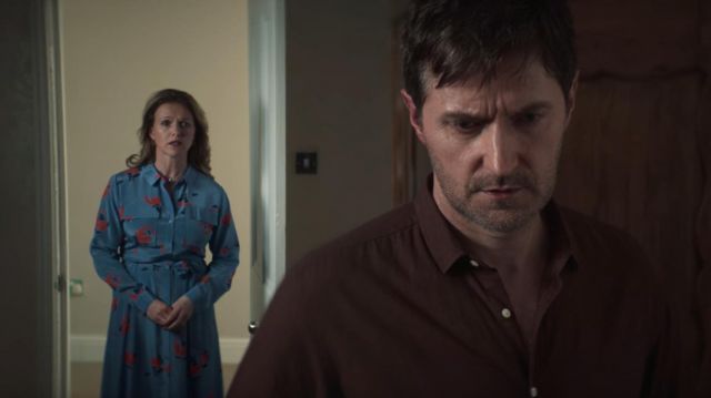 The blue dress printed carried by Corrine Price (Dervla Kirwan) in the series of Intimidation (S01E01)
