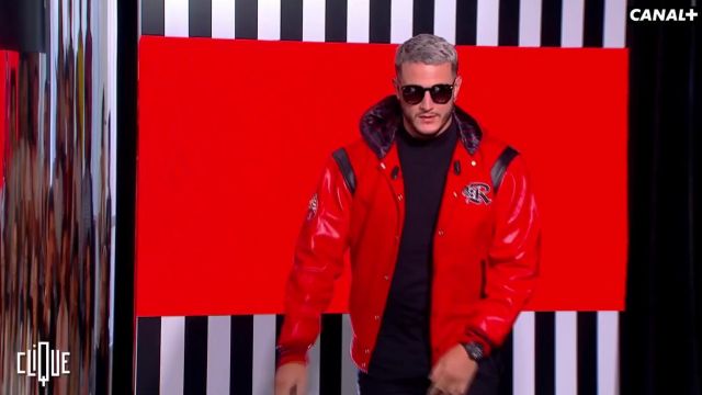 La veste rouge  portée par DJ Snake dans l'émission Clique