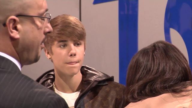 Justin Bieber appears at TOSY Robotics booth at 2012 CES
