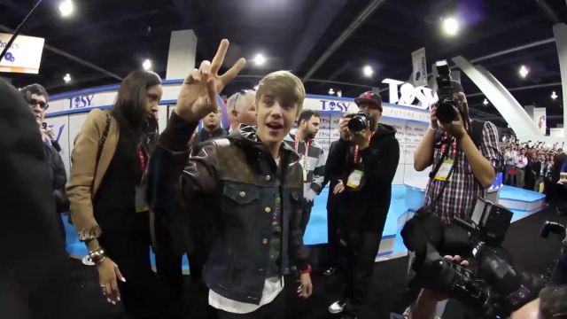 Denim leather jacket worn by Justin Bieber in Justin Bieber CES 2012: Debuts Dancing Robot 'TOSY'!