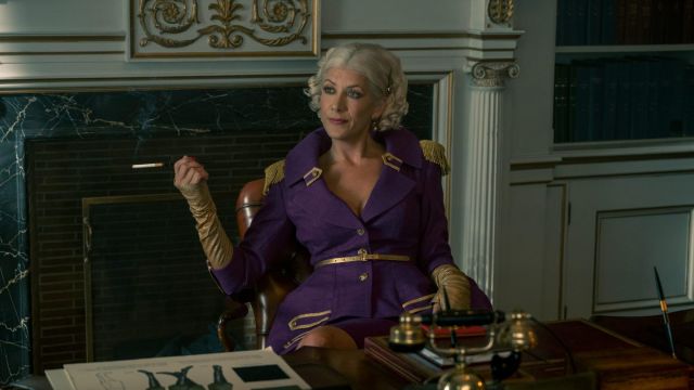 The blazer uniform purple worn by The Handler (Kate Walsh) in the series Umbrella Academy (Season 2)