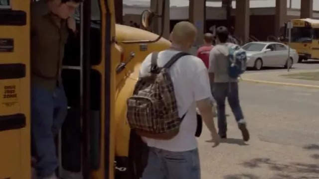 The plaid backpack worn by Schmidt (Jonah Hill) in the movie 21 Jump Street