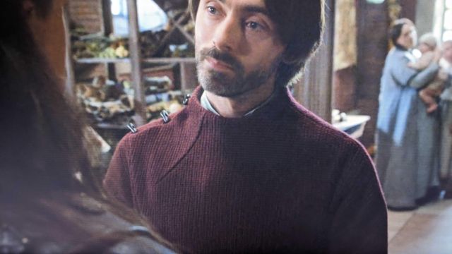 Red knit top with toggles worn by Alfred (David Dawson) in The Last Kingdom (S01E07)