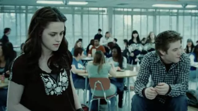 The black and white blouse worn by Bella Swan (Kristen Stewart) in the movie Twilight, Chapter 1: Fascination