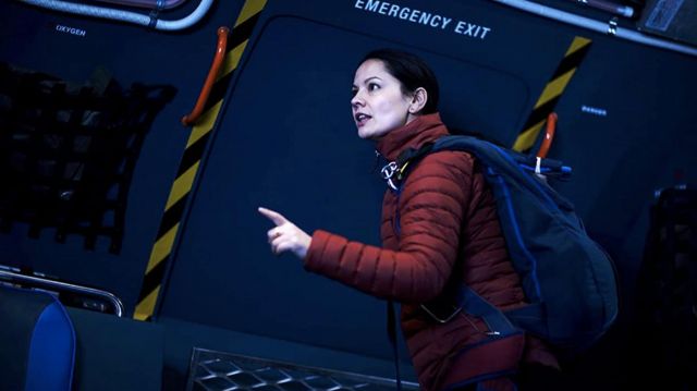 Red coat jacket worn by Dr. Rebecca Aldridge (Ming-Zhu Hii) as seen in La Brea TV show outfits (Season 1 Episode 6)