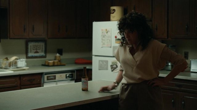 Short sleeve sweater top worn by Phyllis Shapiro (Kathryn Hahn) as seen in The Shrink Next Door TV series wardrobe (S01E02)