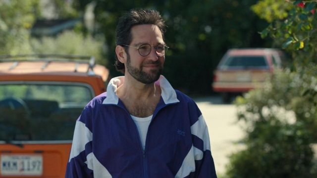 Asics white and blue track jacket worn by Ike (Paul Rudd) as seen in The Shrink Next Door TV show wardrobe (Season 1 Episode 5)