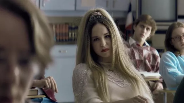 Pearl sweater worn by Mary (Sofie Uretsky) as seen in The Exchange movie