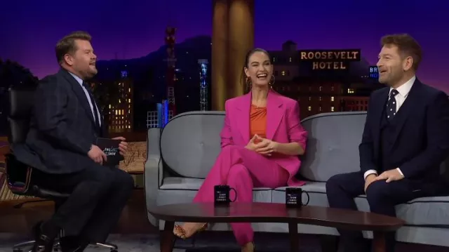 Pink Blazer and pants ensemble worn by Lily James as seen in The Late Late Show with James Corden on February 3, 2022