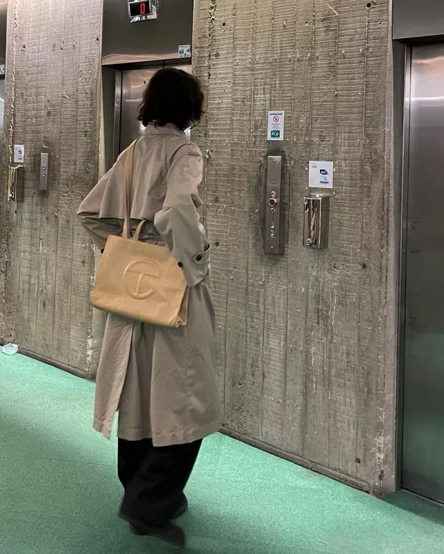 The trench (no blaser collar/no shoulder pads/black buttons) on the account Instagram of @hugodacquet