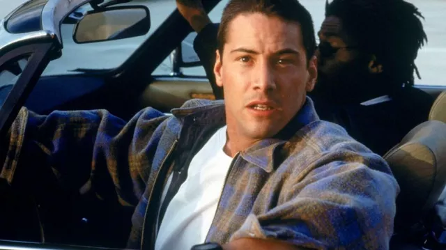 Jack Traven's (Keanu Reeves) blue and yellow checkered fleece jacket in the movie Speed