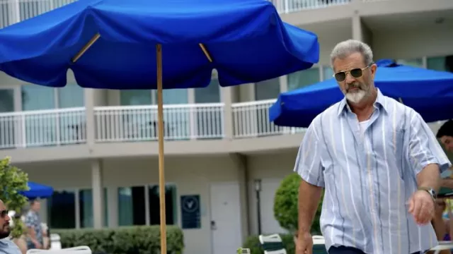 Striped blue shirt worn by Stark (mel Gibson) as seen in Panama movie