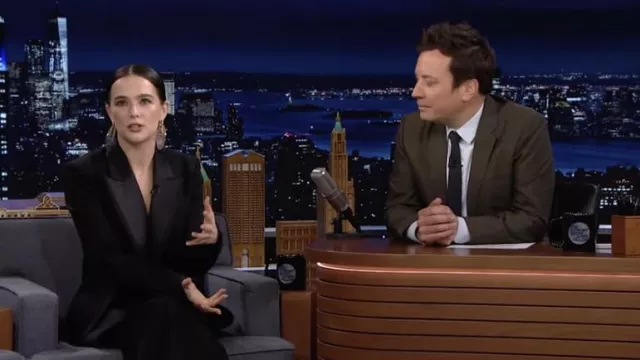 Black smoking suit worn by Zoey Deutch in The Tonight Show Starring Jimmy Fallon on March 8, 2022