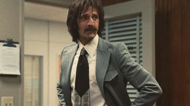 Printed Tie worn by Pat Riley (Adrien Brody) in Winning Time: The Rise of the Lakers Dynasty Wardrobe (Season 1 Episode 3)