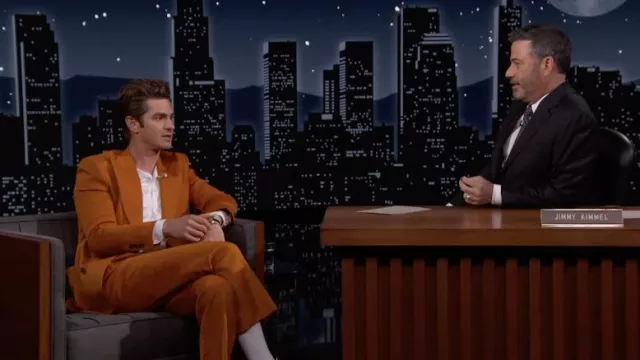 Orange blazer and pants suit ensemble worn by Andrew Garfield as seen in Jimmy Kimmel Live! on march 16, 2022