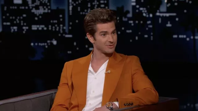 Watch with orange dial worn by Andrew Garfield as seen in Jimmy Kimmel Live! on March 16, 2022