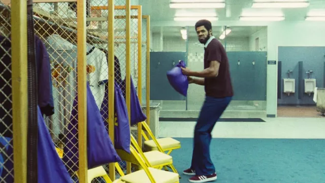Burgundy Sneakers worn by Kareem Abdul-Jabbar (Solomon Hughes) as seen in Winning Time: The Rise of the Lakers Dynasty (S01E05)