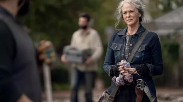 Long Denim Jacket worn by Carol Peletier (Melissa McBride) as seen in The Walking Dead TV series outfits (Season 10 Episode 21)