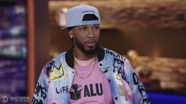 ALU Pink T-shirt worn by Chris Smalls as seen in The Daily Show with Trevor Noah