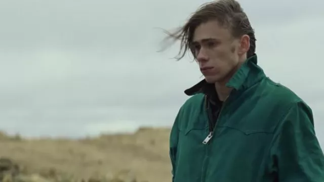 Green Windbreaker jacket worn by Cal (Owen Teague) as seen in Montana Story