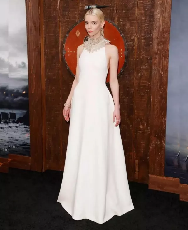 Dior White Long Dress of Anya Taylor-Joy at the Chinese Theatre for THE NORTHMAN premiere and on her Instagram account @anyataylorjoy