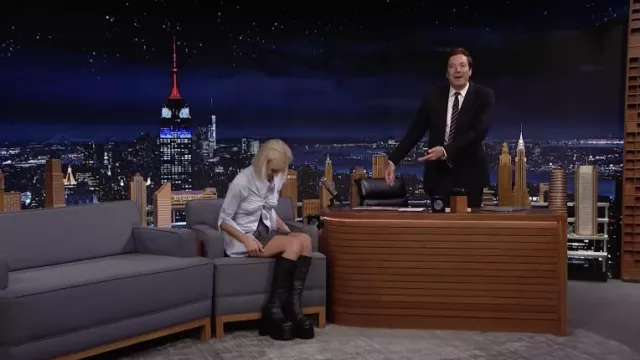Black leather platform boots worn by Emma Chamberlain as seen in The Tonight Show Starring Jimmy Fallon