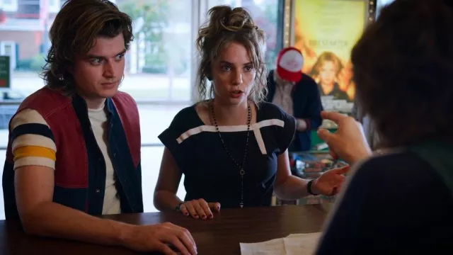The denim jacket with red yoke worn by Steve Harrington (Joe Keery) in the series Stranger Things (S03E08)