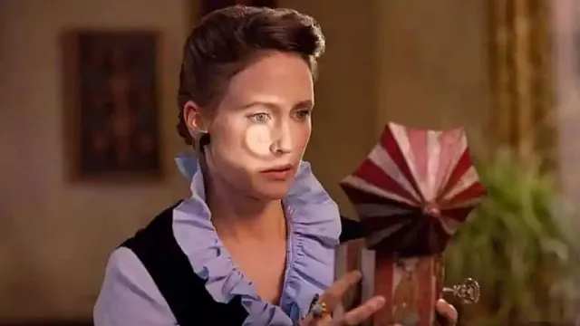 Blue Ruffle Blouse of Lorraine Warren (Vera Farmiga) in The Conjuring