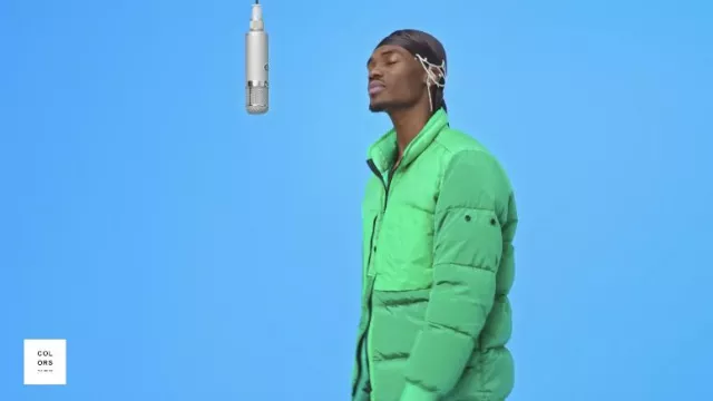 The green down jacket worn by TOBi in its flowers | clip A COLORS SHOW