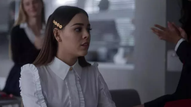 The white ruffled shirt worn by Lucrecia (Danna Paola) in the series Elite (Season 3 Episode 5)