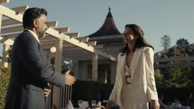 White suit with belt worn by Karla (Antonia Desplat) in Shantaram (Season 1 Episode 4)