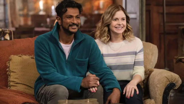Fleece 1/4 zip sweater in green worn by Jay Arondekar (Utkarsh Ambudkar) as seen in Ghosts TV show outfits (Season 2 Episode 7)