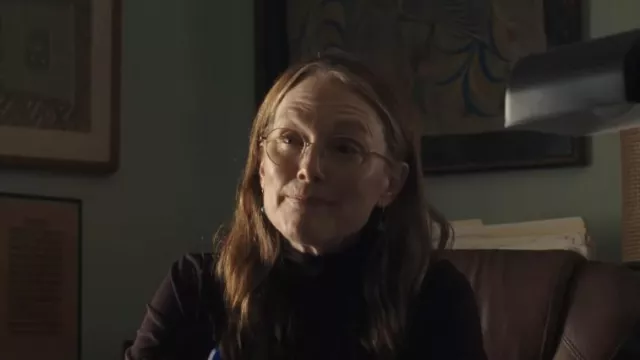 Gold eyeglasses worn by Evelyn (Julianne Moore) as seen in When You Finish Saving the World wardrobe