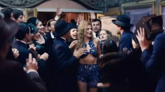 Blue lace bra and shorts set worn by Nellie LaRoy (Margot Robbie) as seen in Babylon